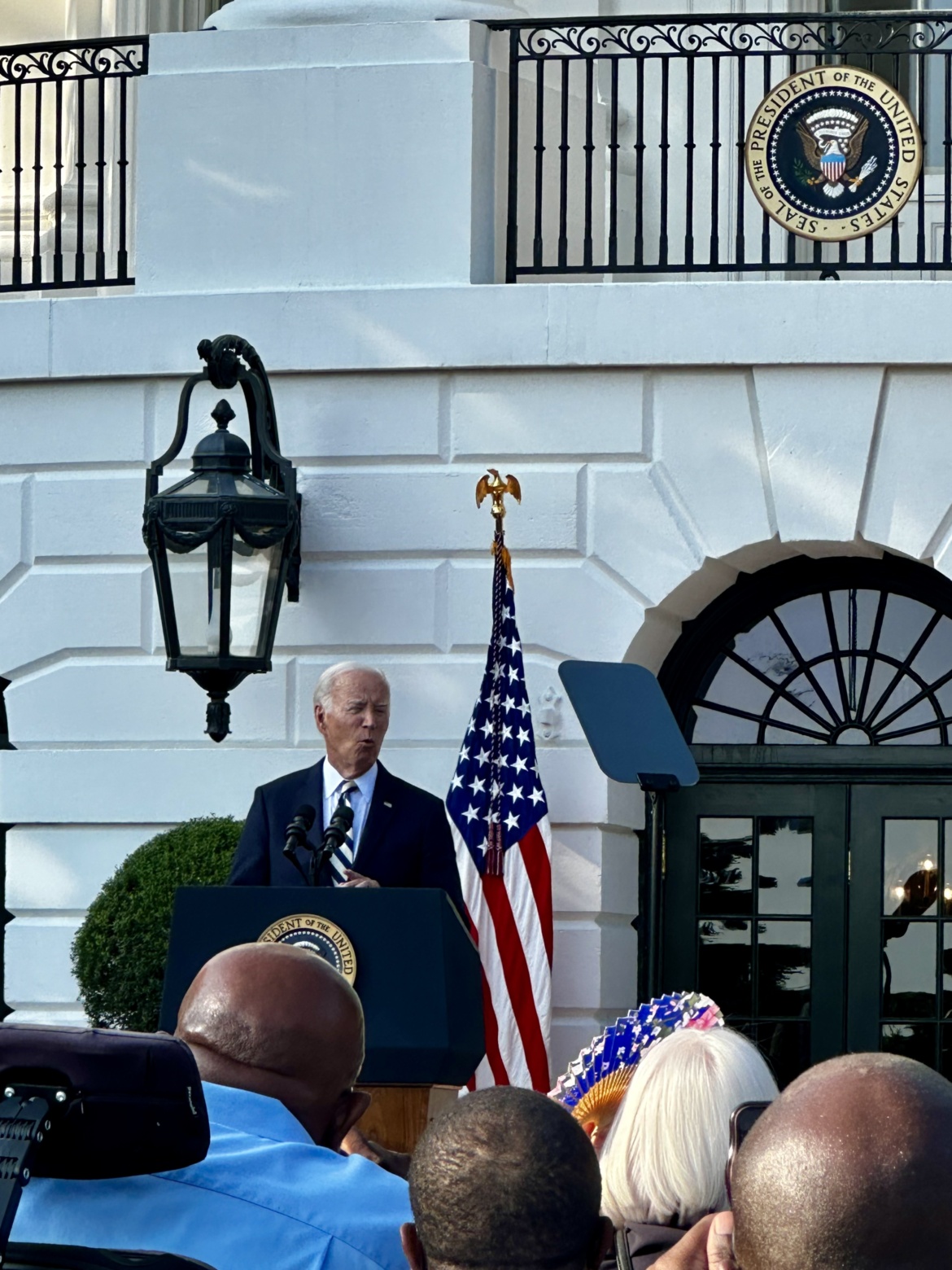 President Biden speaking in front of the White House.